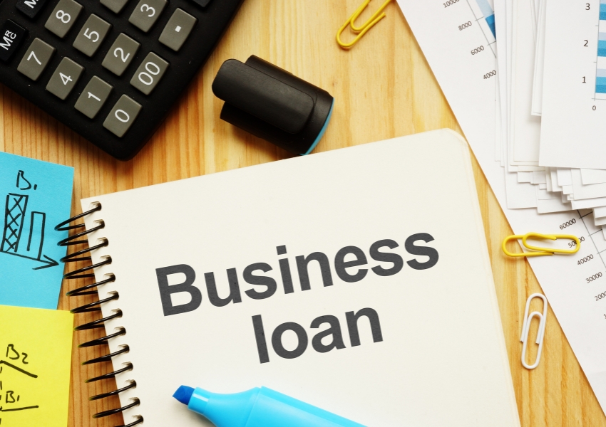 Business loan document on table