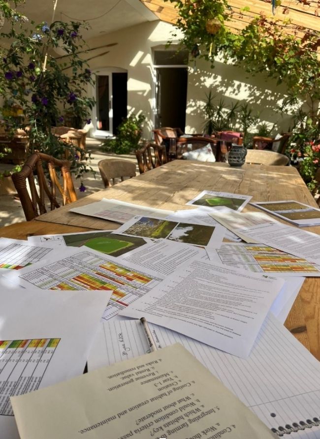 Paperwork on a farm table