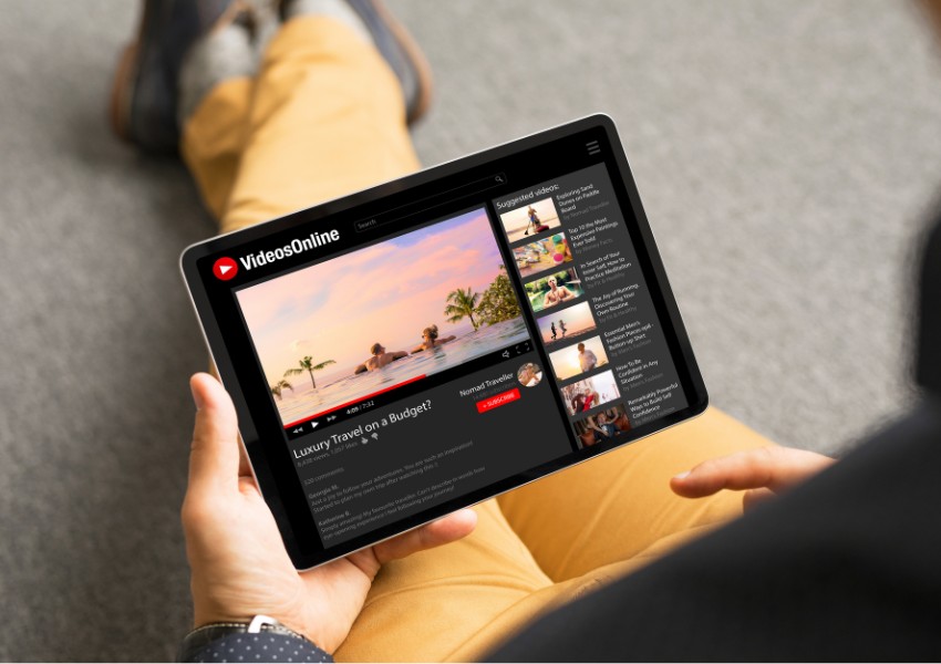 Person viewing videos on a tablet