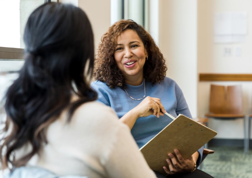 A business owner meeting with a client