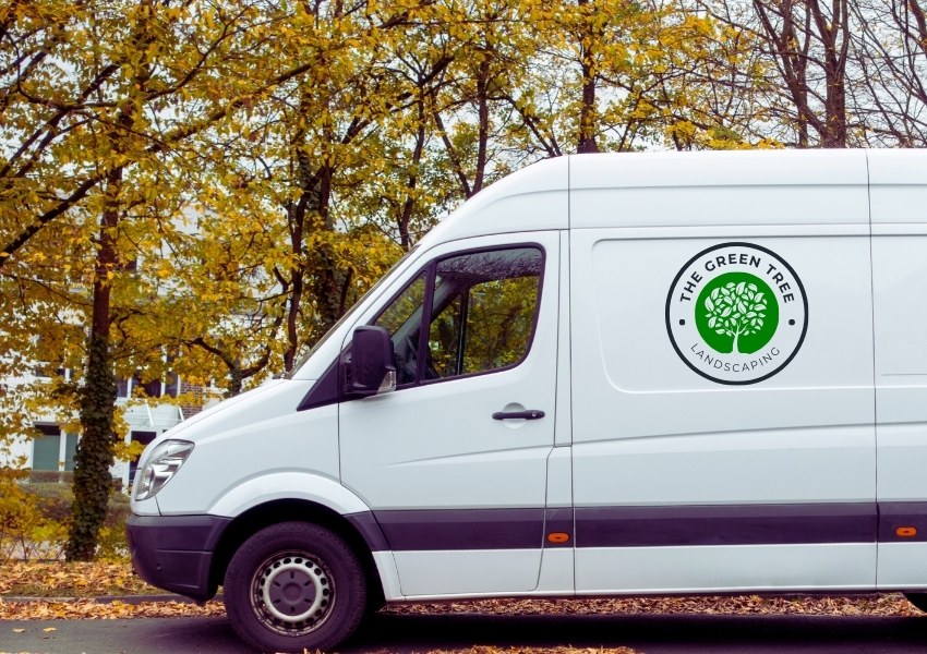 White van with business branding on the side
