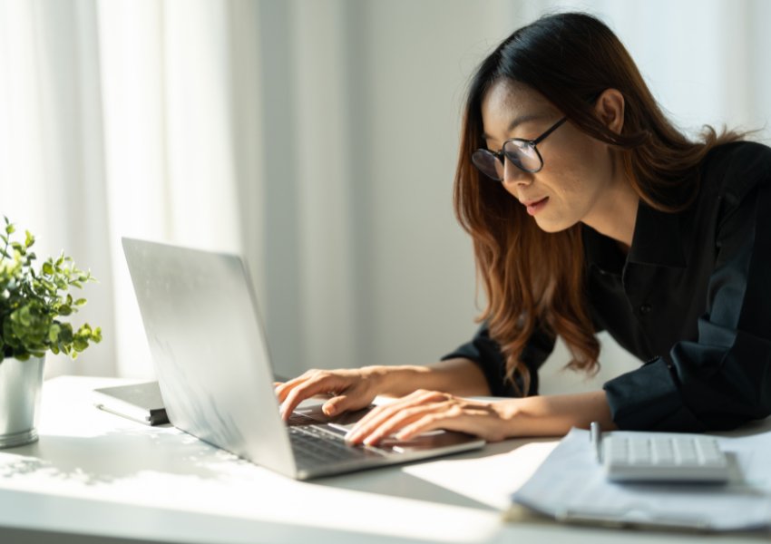 Business owner at her laptop