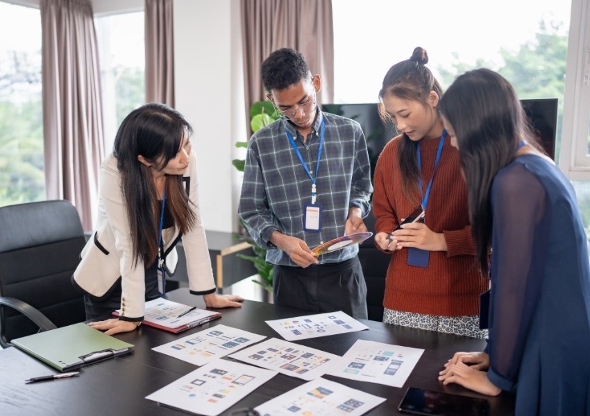 Small business team discussing a product