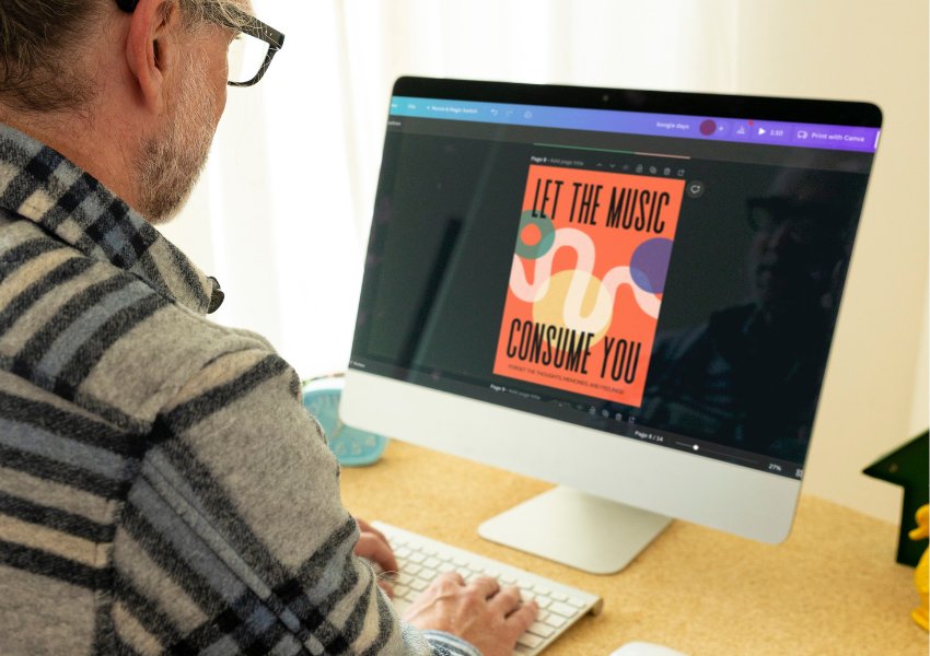 Person using Canva on their laptop